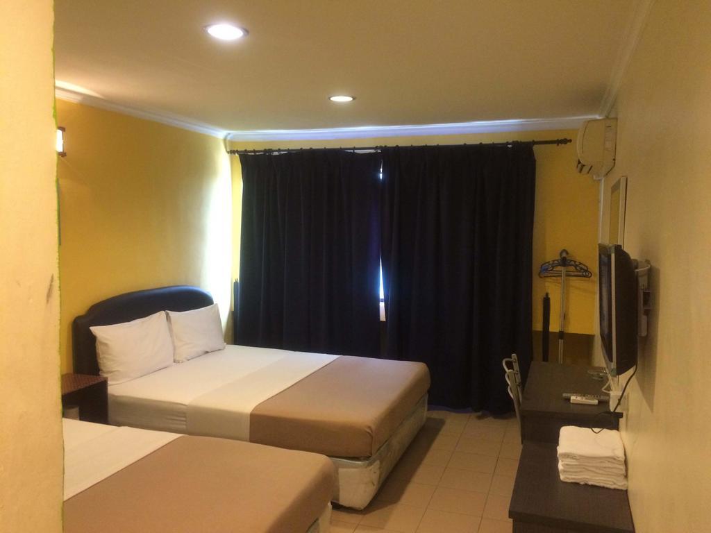 City Star Hotel Kulai Quarto foto