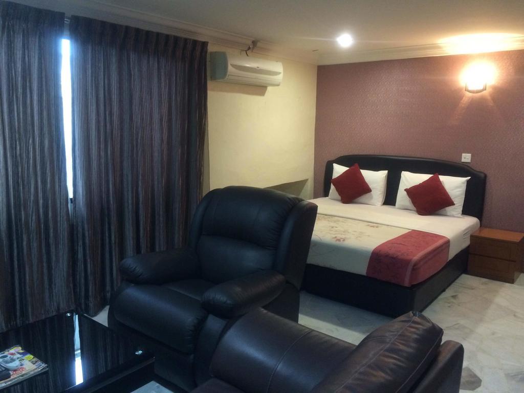 City Star Hotel Kulai Quarto foto