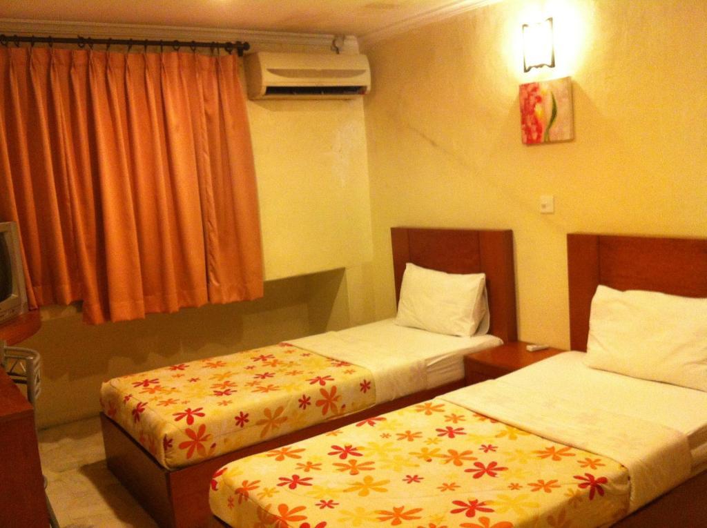 City Star Hotel Kulai Quarto foto